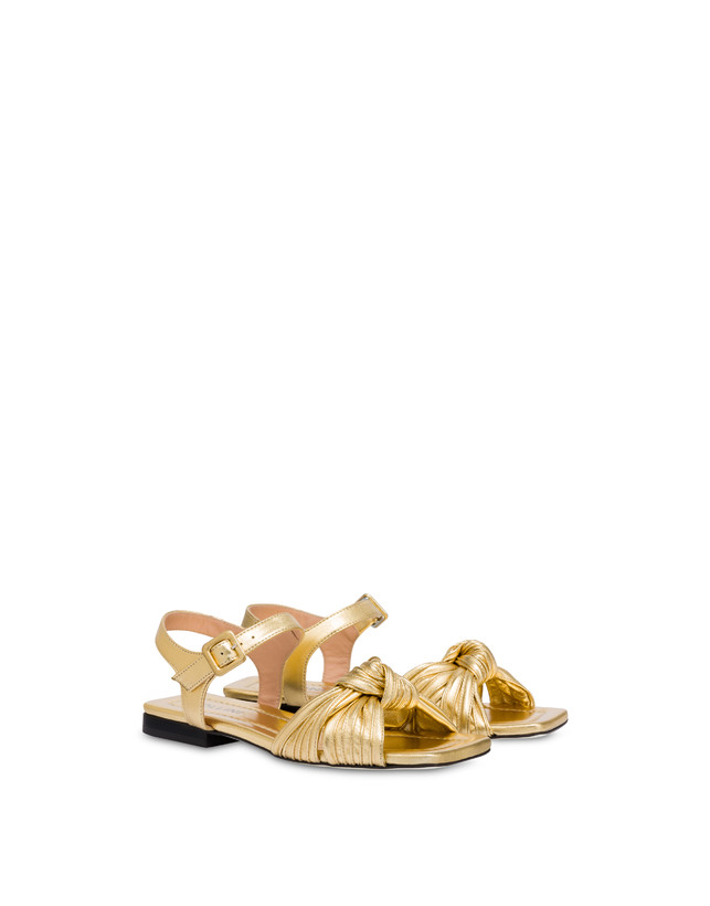 Pollini Sandali Flat In Nappa Laminata Sailor Knot Oro Novità