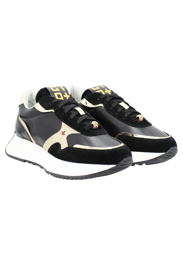 Spatarella Sneakers donna in pelle nera con riporti in pelle oro e zeppa in gomma bianca Outlet